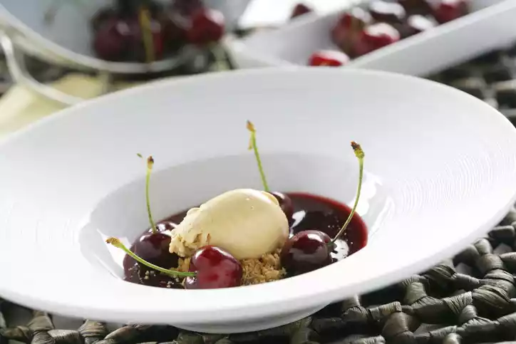 Cherry soup with caramel ice cream