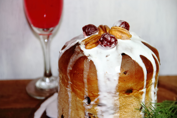 sweet bread Christmas pudding cin dried and glazed fruits and sparkling beverages